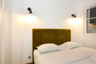 Un ou plusieurs lits dans un hébergement de l'établissement 106- Appartement lumineux face jardins des Plantes - FLAT-GUEST
