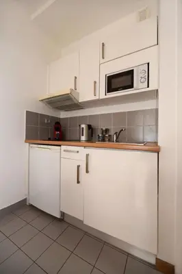 Cuisine ou kitchenette dans l'établissement 106- Appartement lumineux face jardins des Plantes - FLAT-GUEST