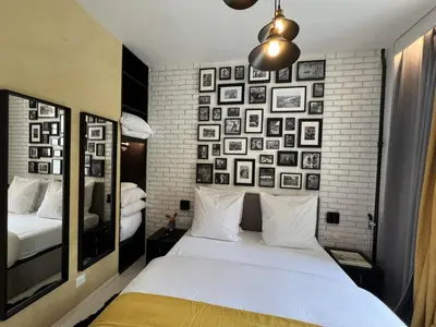 Un ou plusieurs lits dans un hébergement de l'établissement Appartement design Paris 13eme