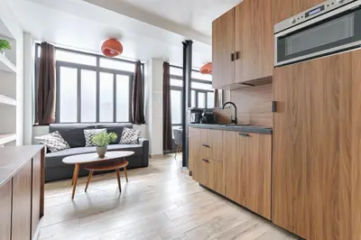 Cuisine ou kitchenette dans l'établissement Appartement de Charme 2BR Canal Saint Martin