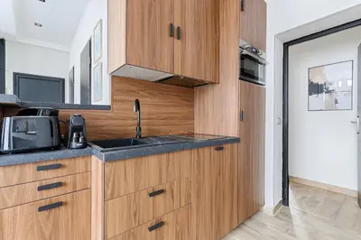 Cuisine ou kitchenette dans l'établissement Appartement de Charme 2BR Canal Saint Martin
