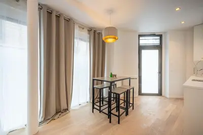 Un ou plusieurs lits dans un hébergement de l'établissement Cosy and Charming flat - 15ème - convention