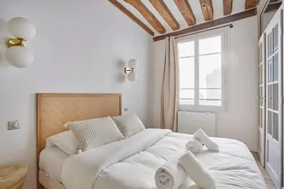 Un ou plusieurs lits dans un hébergement de l'établissement Eiffel Tower Apartment/Invalide by Studioprestige