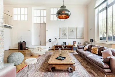 Coin salon dans l'établissement Magnificent Loft Apartment in the Latin Quarter