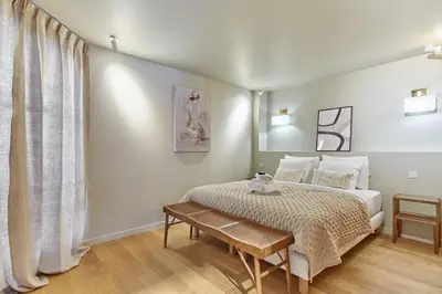 Un ou plusieurs lits dans un hébergement de l'établissement Superb apartment Notre Dame De Paris by Studioprestige