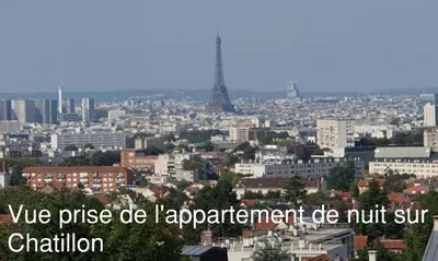 Vue générale sur Paris ou vue de la ville depuis le séjour chez l'habitant