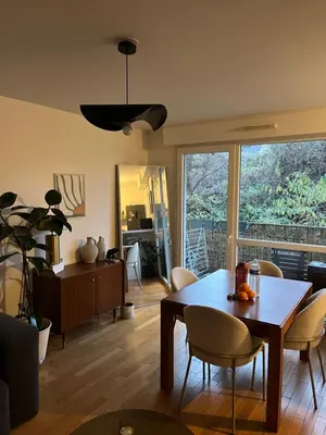 Coin salon dans l'établissement Appartement Paisible au Vert