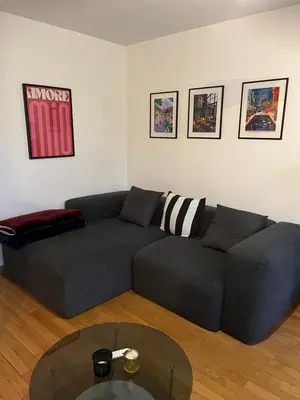 Coin salon dans l'établissement Appartement Paisible au Vert