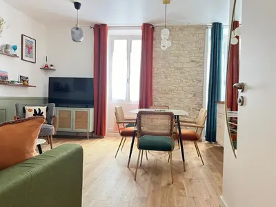 Télévision ou salle de divertissement dans l'établissement Relais Cocorico 