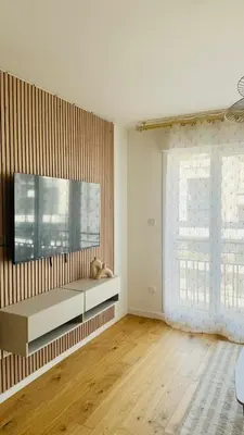Télévision ou salle de divertissement dans l'établissement Bel appartement à 5 mn de Paris très proche Métro 13 et 14