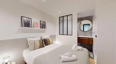 Un ou plusieurs lits dans un hébergement de l'établissement 506 Suite Cadet - Superb apartment in Paris