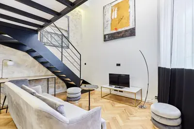 Télévision ou salle de divertissement dans l'établissement Duplex Center of Paris by Studioprestige
