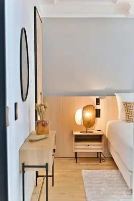Un ou plusieurs lits dans un hébergement de l'établissement Appartement luxueux Musée du Louvre - Rivoli
