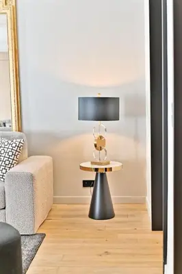 Télévision ou salle de divertissement dans l'établissement Appartement luxueux Musée du Louvre - Rivoli