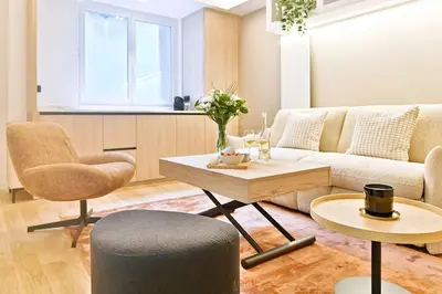 Coin salon dans l'établissement Charmant Appartement Paris Châtelet-Les Halles
