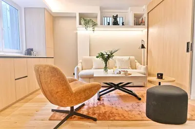 Coin salon dans l'établissement Charmant Appartement Paris Châtelet-Les Halles