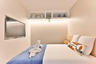Un ou plusieurs lits dans un hébergement de l'établissement Charmant Appartement Paris Châtelet-Les Halles