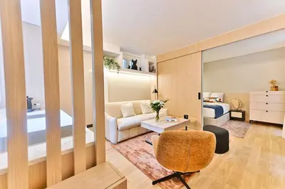 Coin salon dans l'établissement Charmant Appartement Paris Châtelet-Les Halles