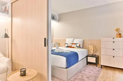 Un ou plusieurs lits dans un hébergement de l'établissement Charmant Appartement Paris Châtelet-Les Halles