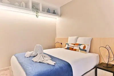 Un ou plusieurs lits dans un hébergement de l'établissement Charmant Appartement Paris Châtelet-Les Halles