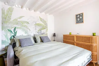 Un ou plusieurs lits dans un hébergement de l'établissement GuestReady - Modern comfort near Palais Garnier