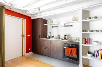 Cuisine ou kitchenette dans l'établissement GuestReady - Modern comfort near Palais Garnier