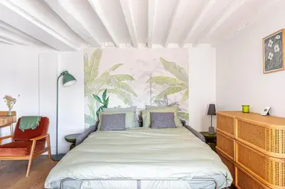Un ou plusieurs lits dans un hébergement de l'établissement GuestReady - Modern comfort near Palais Garnier