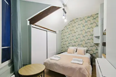 Un ou plusieurs lits dans un hébergement de l'établissement 525 Suite Montrouge - Superbe appartement