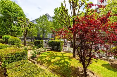 Jardin de l'établissement GuestReady - Charmant appartement dans le 16ème