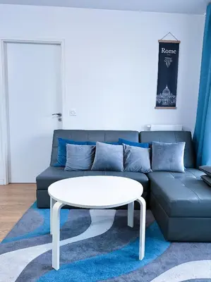 Coin salon dans l'établissement Appartement à 15 mins de Paris