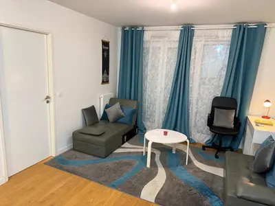 Coin salon dans l'établissement Appartement à 15 mins de Paris