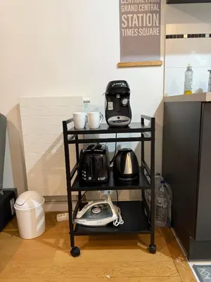 Cuisine ou kitchenette dans l'établissement Appartement à 15 mins de Paris