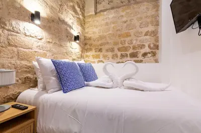 Un ou plusieurs lits dans un hébergement de l'établissement Typical Parisian Apart#Quatier Latin#Notre Dame#