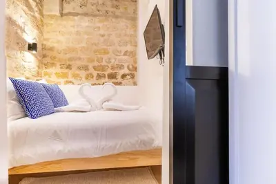 Un ou plusieurs lits dans un hébergement de l'établissement Typical Parisian Apart#Quatier Latin#Notre Dame#