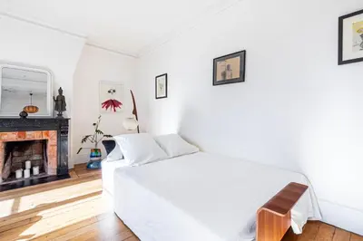 Un ou plusieurs lits dans un hébergement de l'établissement GuestReady - A Zen haven near Montmartre
