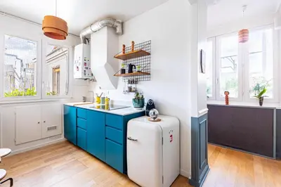 Cuisine ou kitchenette dans l'établissement GuestReady - A Zen haven near Montmartre