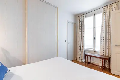 Un ou plusieurs lits dans un hébergement de l'établissement GuestReady - Magnificent stay in the 3rd Arr.