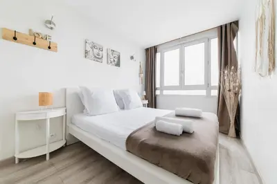 Un ou plusieurs lits dans un hébergement de l'établissement Appartement Versailles Eiffel