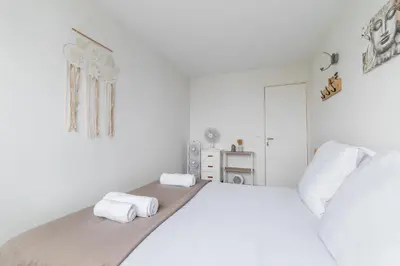 Un ou plusieurs lits dans un hébergement de l'établissement Appartement Versailles Eiffel
