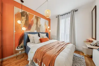 Un ou plusieurs lits dans un hébergement de l'établissement Appartement Cosy à 2 pas de Paris