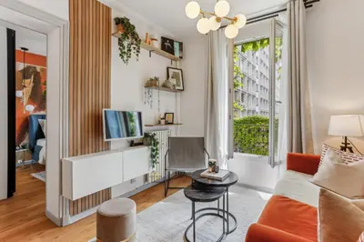 Coin salon dans l'établissement Appartement Cosy à 2 pas de Paris