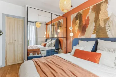 Un ou plusieurs lits dans un hébergement de l'établissement Appartement Cosy à 2 pas de Paris