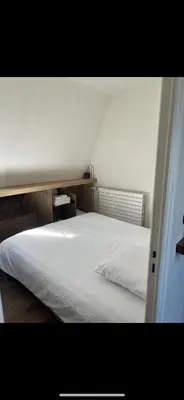 Un ou plusieurs lits dans un hébergement de l'établissement Magnifique appartement