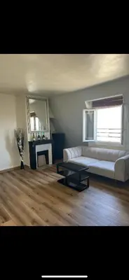 Coin salon dans l'établissement Magnifique appartement