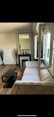 Un ou plusieurs lits dans un hébergement de l'établissement Magnifique appartement