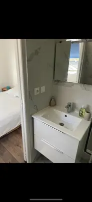 Un ou plusieurs lits dans un hébergement de l'établissement Magnifique appartement