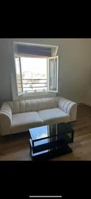 Coin salon dans l'établissement Magnifique appartement