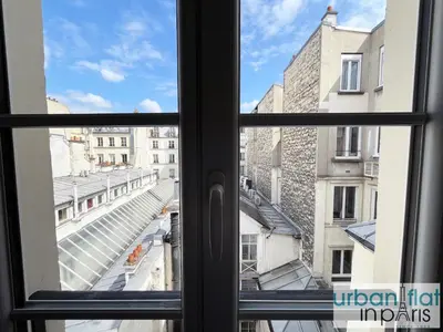 Vue générale sur Paris ou vue de la ville depuis l'appartement
