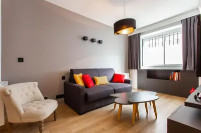Coin salon dans l'établissement Magnificent apartment - 2BR-6P - Republique