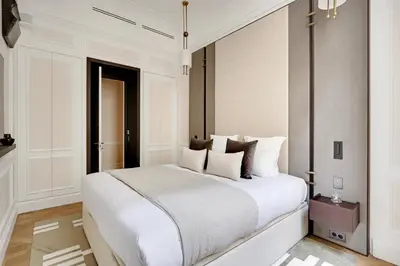 Un ou plusieurs lits dans un hébergement de l'établissement TheLander - Serviced Apartments in Louvre